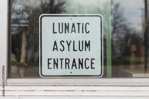 Sign in store window that reads 