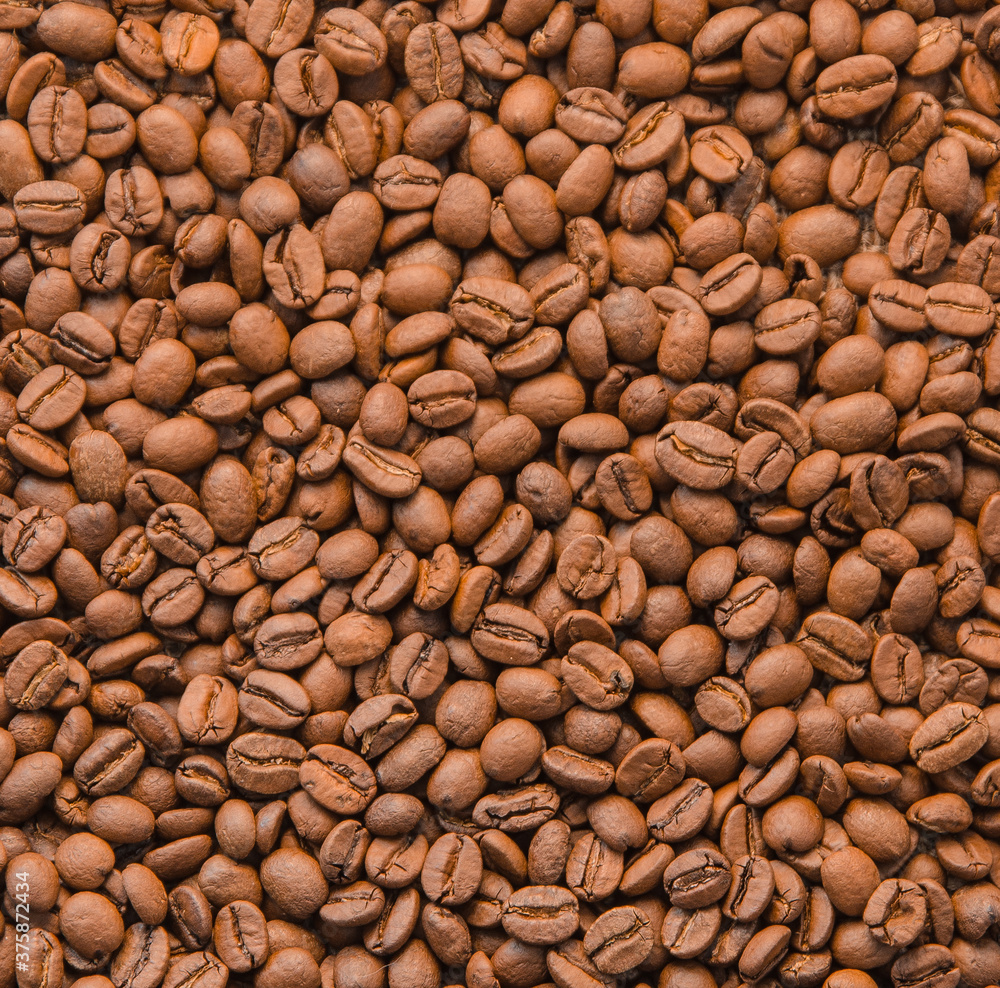 Top view of coffee beans background Top view of coffee beans background