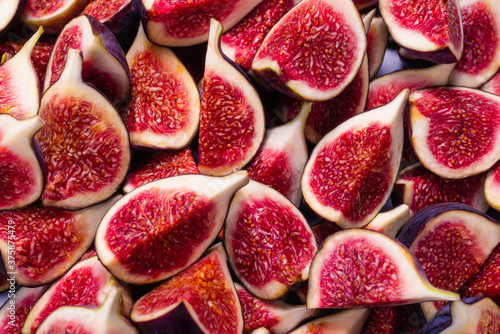 Tasty figs background. Top view. photo