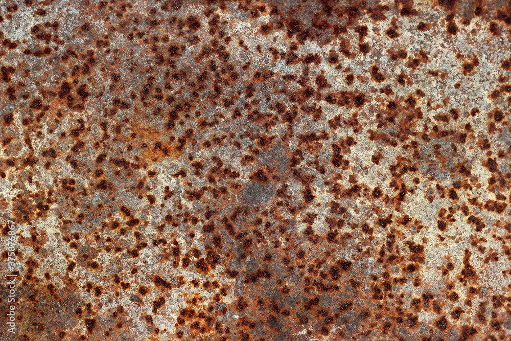 Rusty iron texture, caverns on metal surface Rusty iron texture, caverns on metal surface