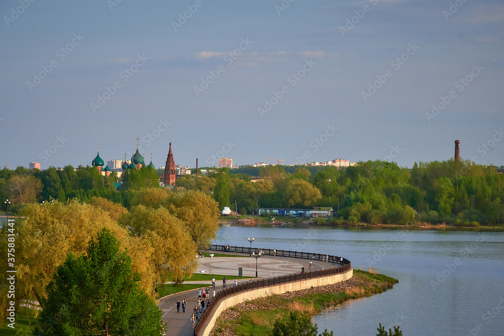 Volga river and city park with cityscape in Yaroslavl, Russia