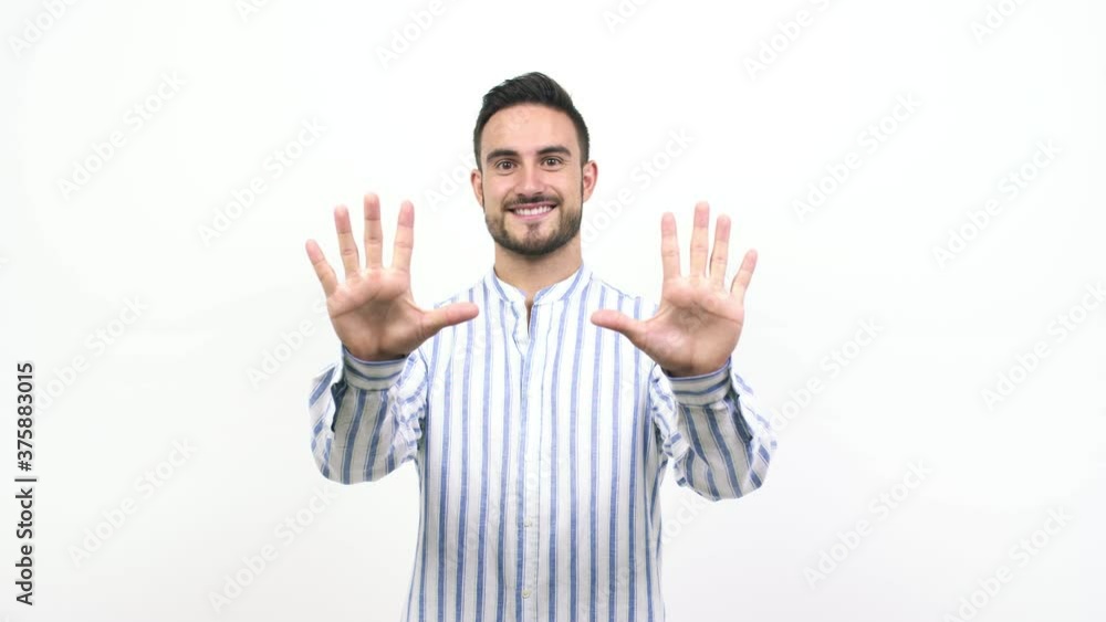Young caucasian man showing number ten, symbol of counting, concept of mathematics, confident and cheerful Young caucasian man showing number ten, symbol of counting, concept of mathematics, confident and cheerful