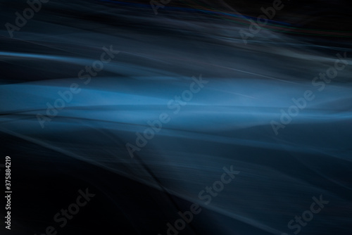 Abstract blue and black background photo