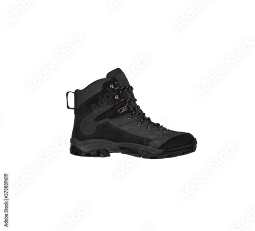 Modern mountain boots isolate on a white back. Shoes for outdoor activities and travel.