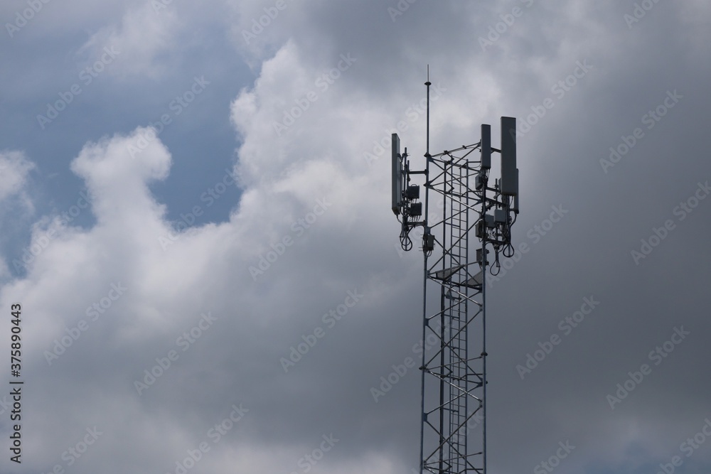 Telecommunications antennas, radio and satellite communication technology, telecommunications industry Mobile network or telecommunications 4g separated from the blue background. Telecommunications antennas, radio and satellite communication technology, telecommunications industry Mobile network or telecommunications 4g separated from the blue background.