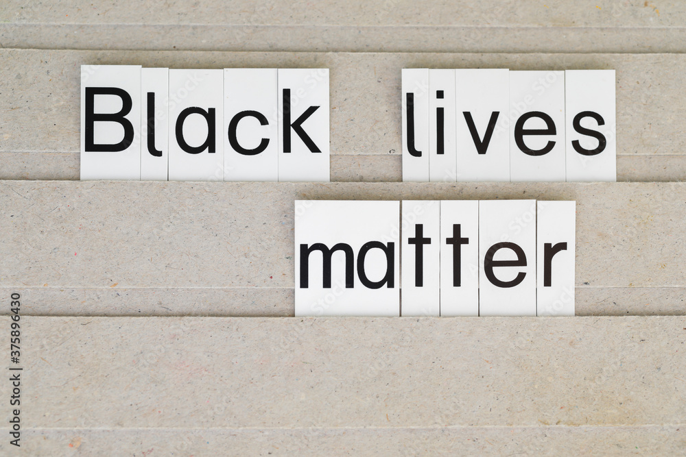 Obraz premium Black lives matter as a Message with single letters on s board 