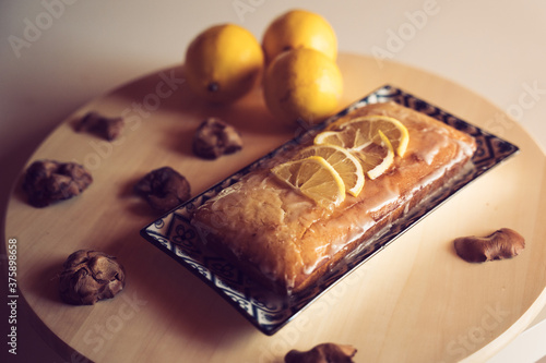 Lemon Cake with lemons and lemon slices