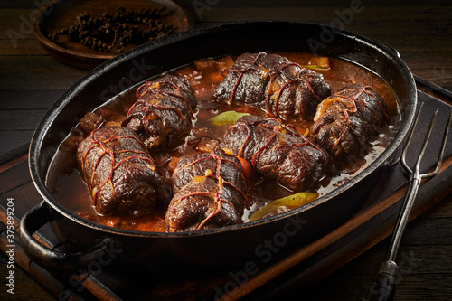 Dish of delicious beef roulades in spicy gravy