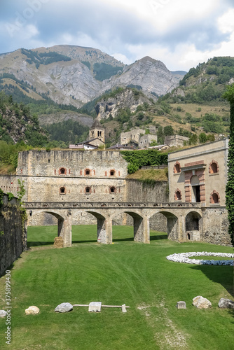 Fort Albertino di Vinadio, located in the valley of the river Stura di Demonte, with mountains in the background, commune of Vinadio, Piedmont region, province of Cuneo, Italy