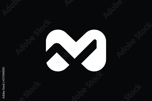 Minimal Innovative Initial NM logo and MN logo. Letter NM MN creative elegant Monogram. Premium Business logo icon. White color on black background