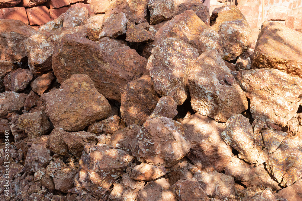 Gravel, red stone for rubble, blocks and bricks.