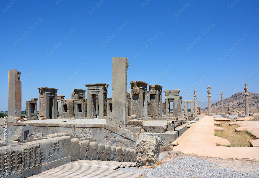 Palace of Darius,  called Tachara  or winter palace, in Persepolis.  Western view through the Palace of Xerxes, called Hadish court.