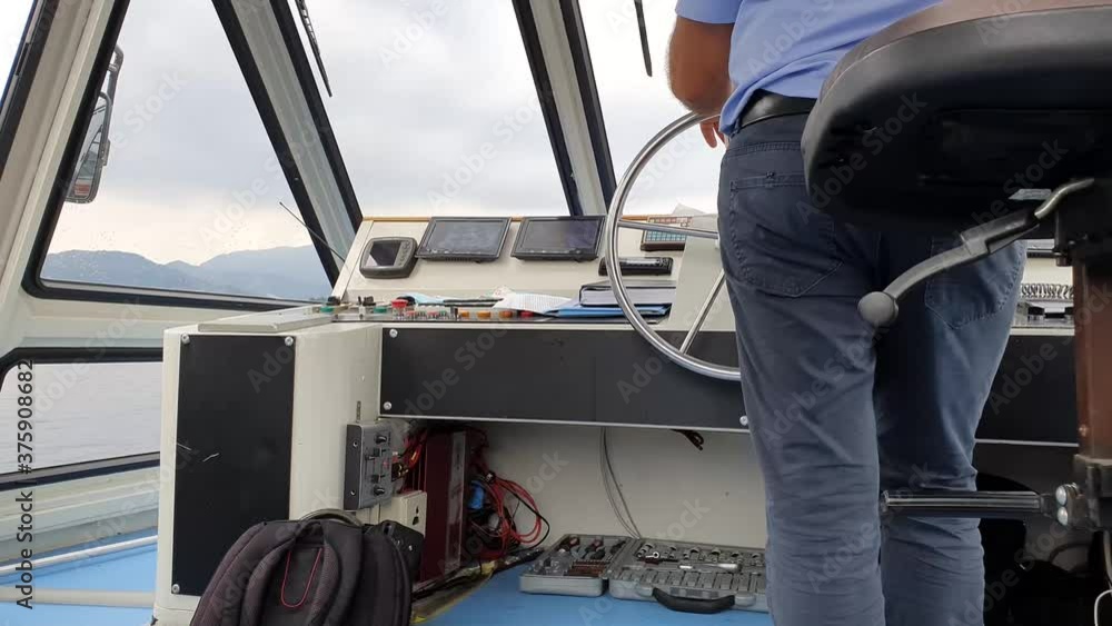 boat cabin with rudder and helmsman boat cabin with rudder and helmsman