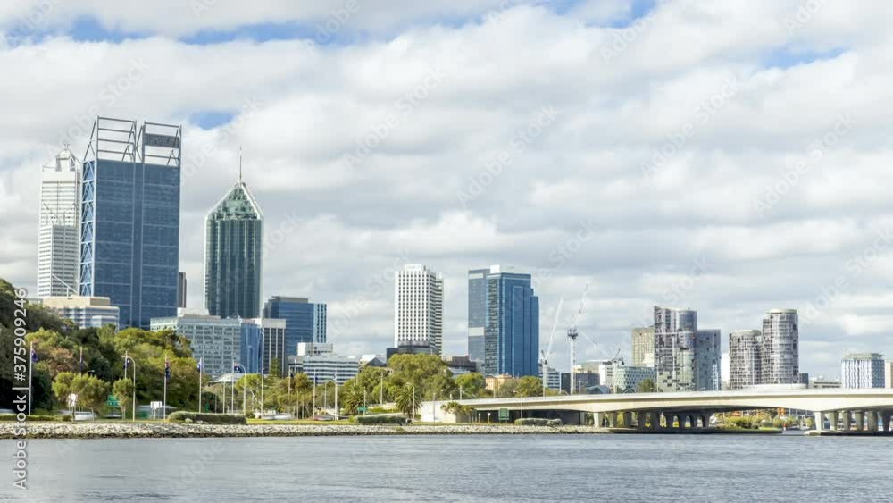 Timelapse of Perth city CBD during the day showing clouds moving. Moving cloud-scape, Business and financial districts of Western Australia. Capital city Tourism. Timelapse of Perth city CBD during the day showing clouds moving. Moving cloud-scape, Business and financial districts of Western Australia. Capital city Tourism.