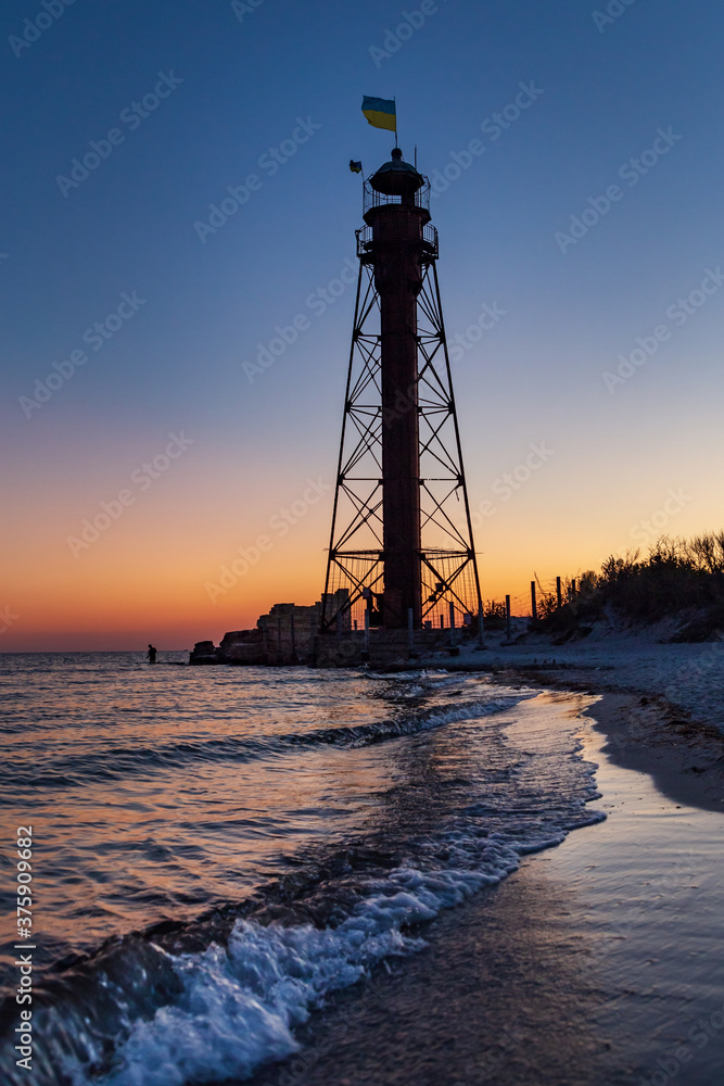Beautiful old lighthouse on the island. Dzharylgach Island in Ukraine