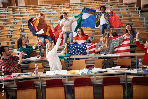 Cheerful students with flags of theirs countries