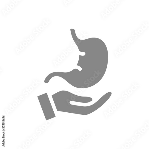 Human stomach on hand grey icon. Care, disease prevention symbol