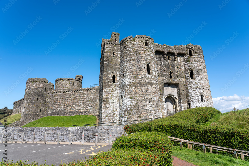 Fototapeta premium Kidwelly Castle fortress Carmarthenshire South Wales UK a 13th century Norman medieval fort a popular travel destination landmark stock photo image