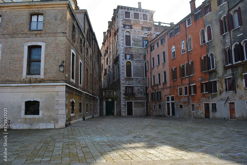old street in venice with traditional buildings no people