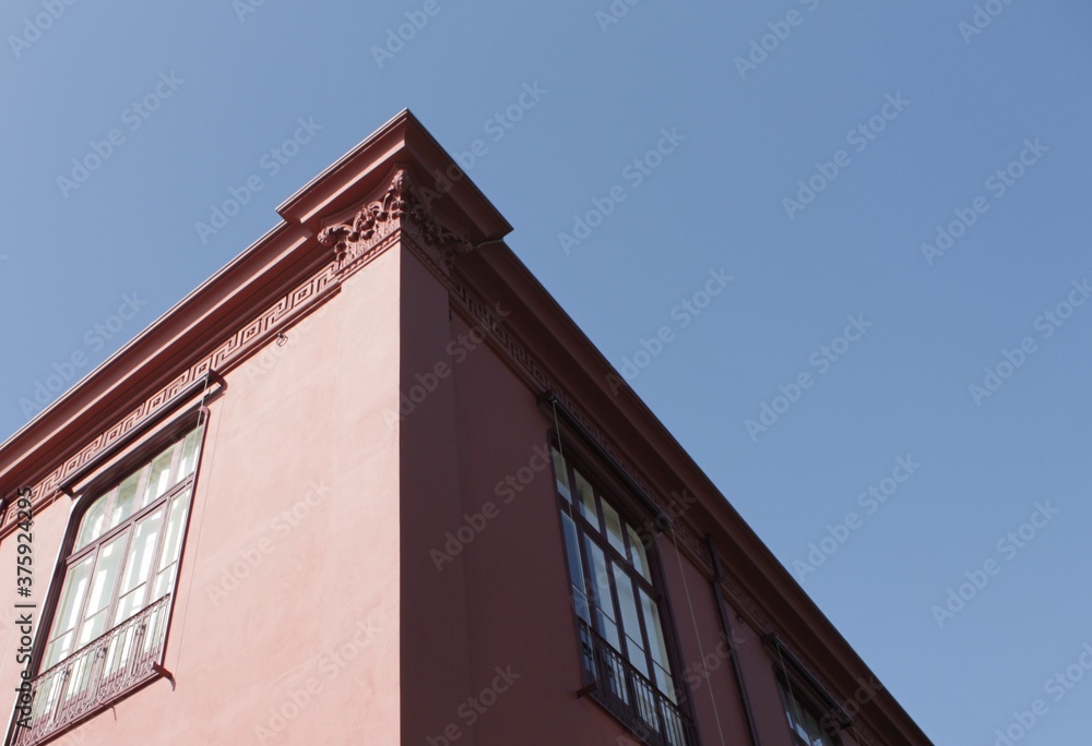 old brick building with blue sky old brick building with blue sky
