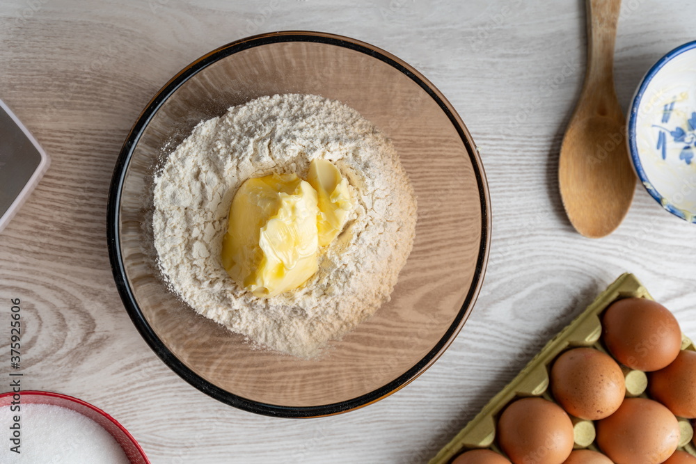 Butter in a bowl of flour Butter in a bowl of flour