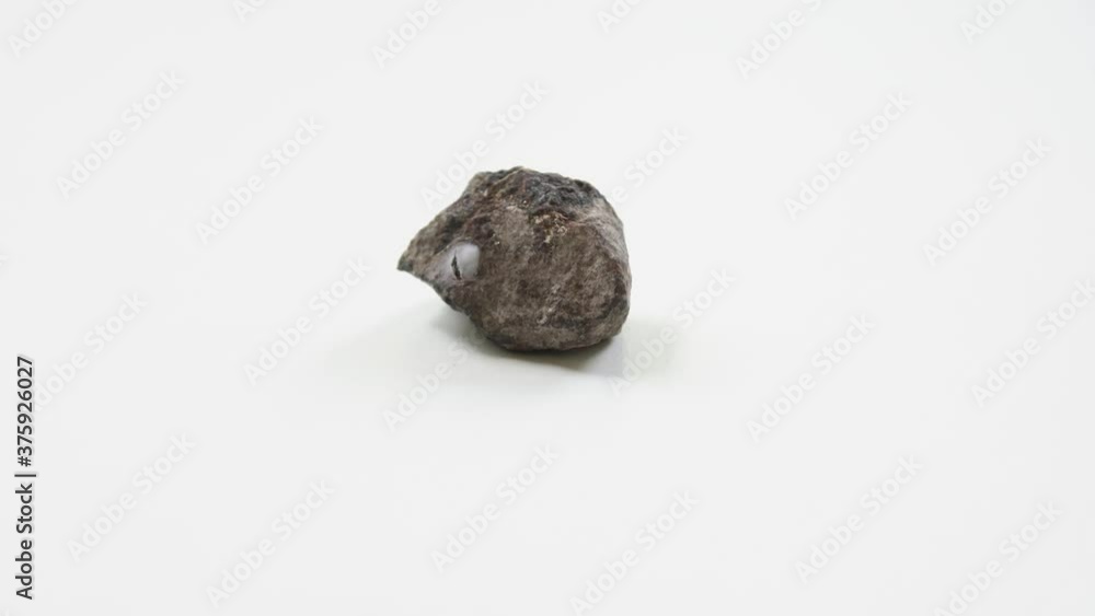 detail of hematite with pyrite over white background detail of hematite with pyrite over white background