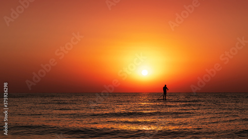 Man on the water paddle board © maximchuk