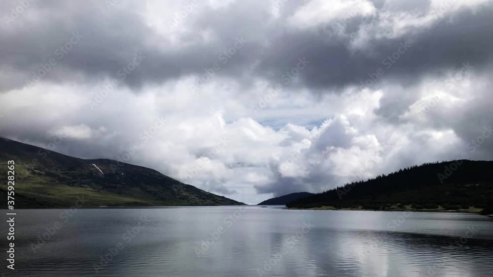 Time lapse view from high mountain lake located in Bulgaria Time lapse view from high mountain lake located in Bulgaria