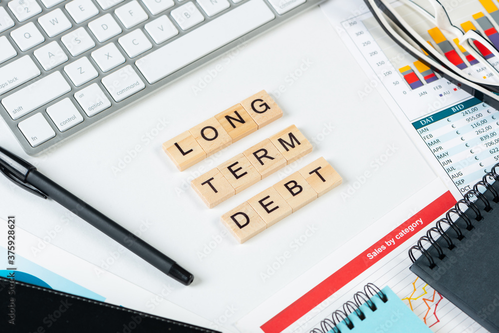 Long term debt concept with letters Long term debt concept with letters