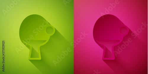 Paper cut Racket for playing table tennis icon isolated on green and pink background. Paper art style. Vector.