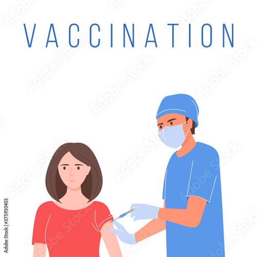 The doctor holds the syringe and puts the vaccine to a woman. Vaccination against virus.