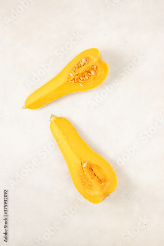 Fresh butternut pumpkin (squash) isolated on white background. Top view with copy space.