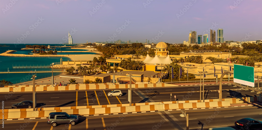 A view across the entrance to the Palm Jumeirah complex in Dubai, UAE in springtime A view across the entrance to the Palm Jumeirah complex in Dubai, UAE in springtime