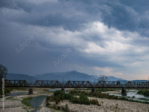 long train bridge on rain climate