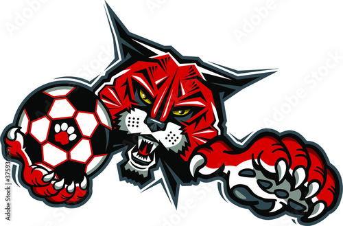 wildcat soccer team mascot holding ball for school, college or league