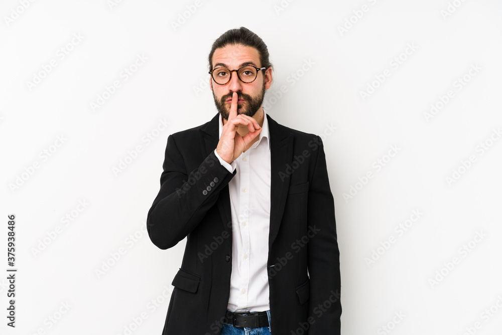 Young caucasian business man isolated on a white background keeping a secret or asking for silence. Young caucasian business man isolated on a white background keeping a secret or asking for silence.