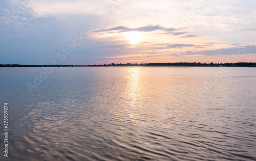 Scenic sunset over the lake © Yuliia