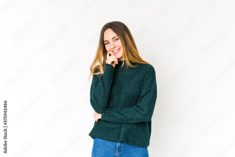 Young caucasian woman isolated on white background smiling happy and confident, touching chin with hand. Young caucasian woman isolated on white background smiling happy and confident, touching chin with hand.