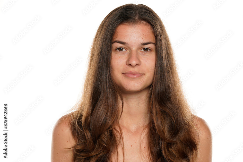 Portrait of a young woman without makeup., isolated on white background. Portrait of a young woman without makeup., isolated on white background.
