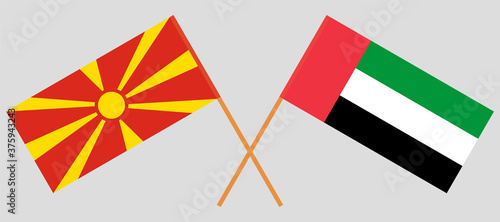 Crossed flags of North Macedonia and the United Arab Emirates