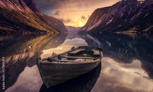 norwegian fjord , calm , and a boat