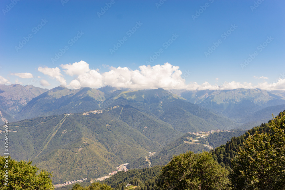 Alps mountain meadow tranquil summer view. Mountain valley village landscape summer. Mountain village view. Village in mountains. Mountain valley village landscape.