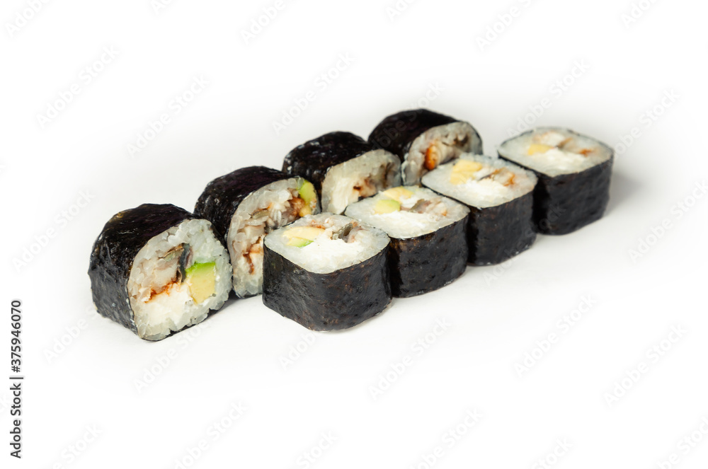 Sushi roll with eel and avocado on a white plate, classic Japanese sushi. Traditional Japanese food with maki Delicious pieces of sushi. For the restaurant menu. copyspace.