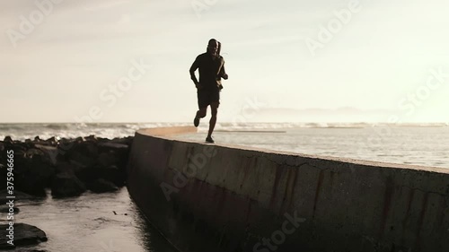 Man running on the promenade