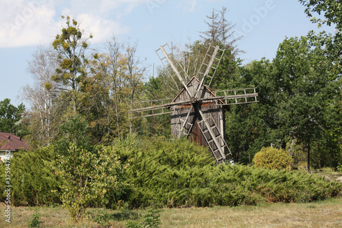 Obraz na płótnie Rural summer landscape with an old mill. w salonie