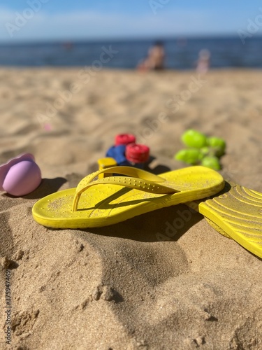 colorful flip flops on the beach