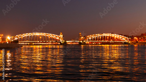 Bridge of Peter Great in Saint-Petersburg, Russia. Night view.