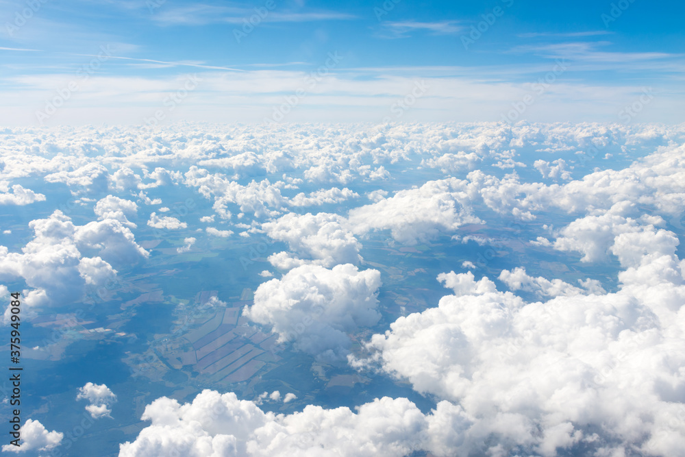 Fototapeta premium view of the clouds from the plane window