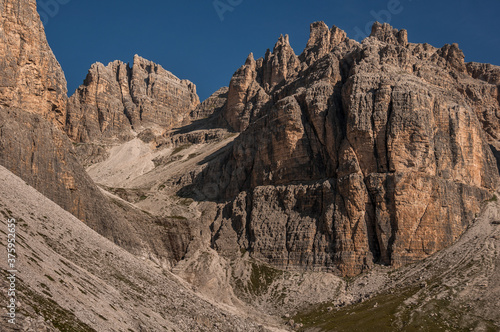 Great view of the Sesto Dolomites mountains as seen from trekking trail #104 from Lavaredo refuge to Pian di Cengia refuge via Pian di Cengia mountain pass, Dolomites, South Tirol, Italy.