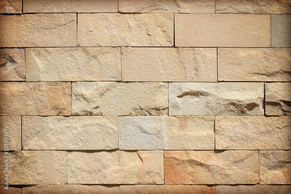 Fototapeta premium old brown slate wall stone background or texture.